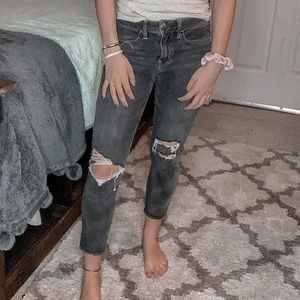 Black skinny jeans with holes